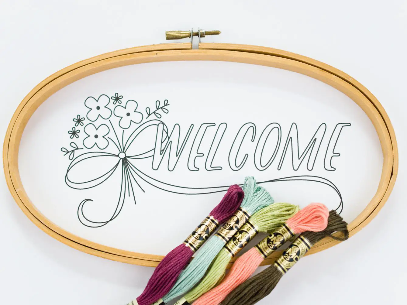 1. Pretty Posy Welcome Embroidery Designs