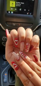 Red Glitter Nails With Heart Motifs