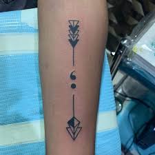 Semicolon Arrow Tattoo On Forearm