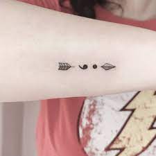 Small Semicolon Arrow Tattoo
