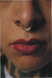 Double Nose Piercing With Septum