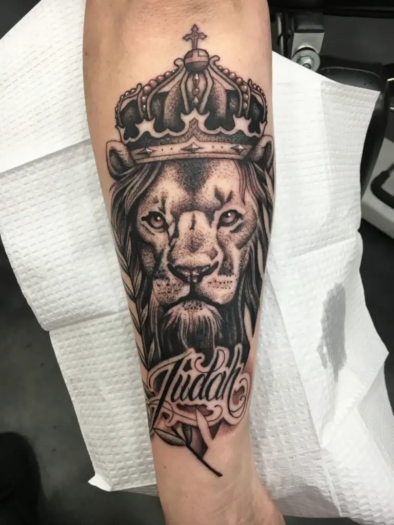 Lion With Crown Forearm Tattoo