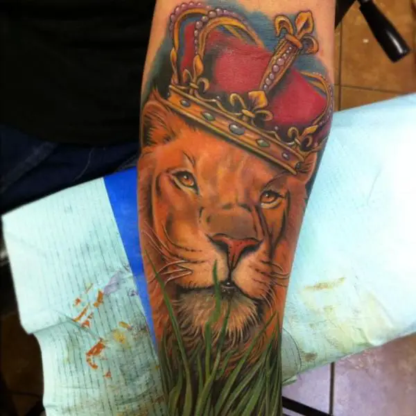 Realistic Lion With Crown Tattoo
