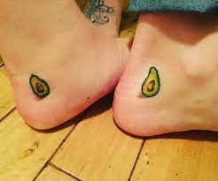 matching avocado halves tattoo