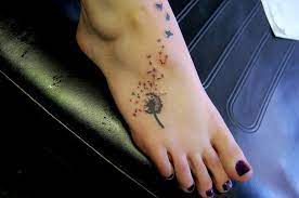 dandelion foot tattoo