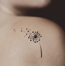minimalist dandelion tattoo