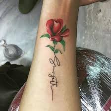 rose and name tattoo