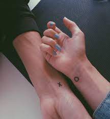 x and o tattoo