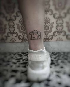 camera ankle tattoo small