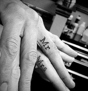 mr and mrs finger tattoos