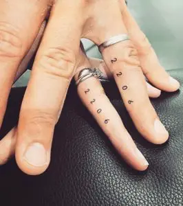 wedding year finger tattoo