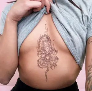 Dragon Breast Tattoo