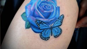 Blue Butterfly Tattoo On Thigh