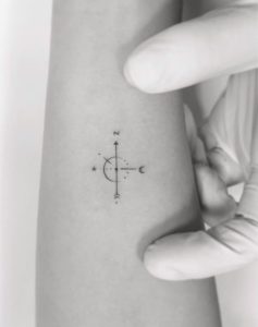 Minimalist compass tatto