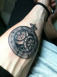 moral compass arm tattoo
