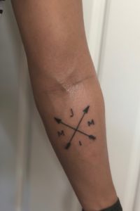 compass tattoo with family initials