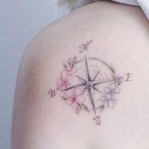 compass tattoo with flowers