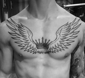 Crown Tattoo With Wings On Chest