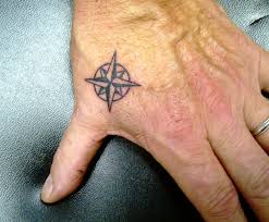 small tribal compass tattoo