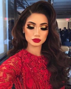 Gold make up look with red dress
