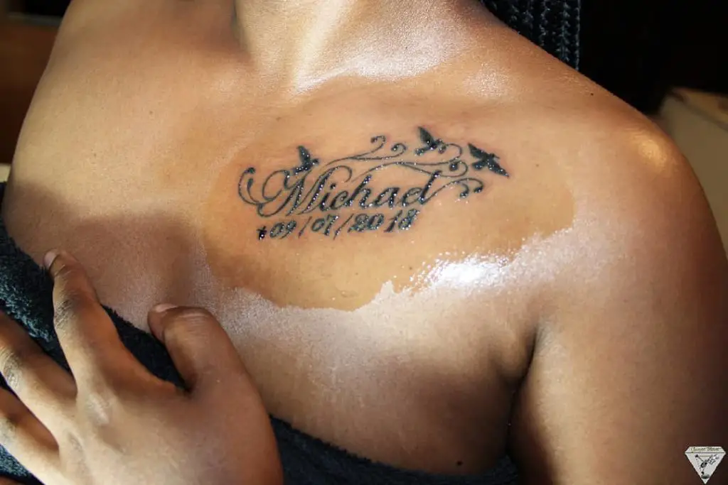 Name And Date Chest Tattoo