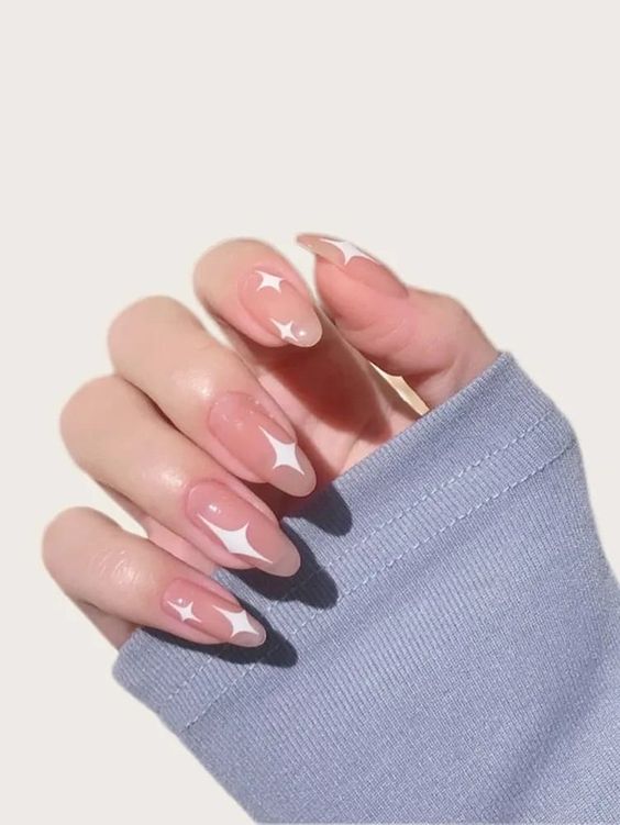 Nude Nails With White Nail Art 