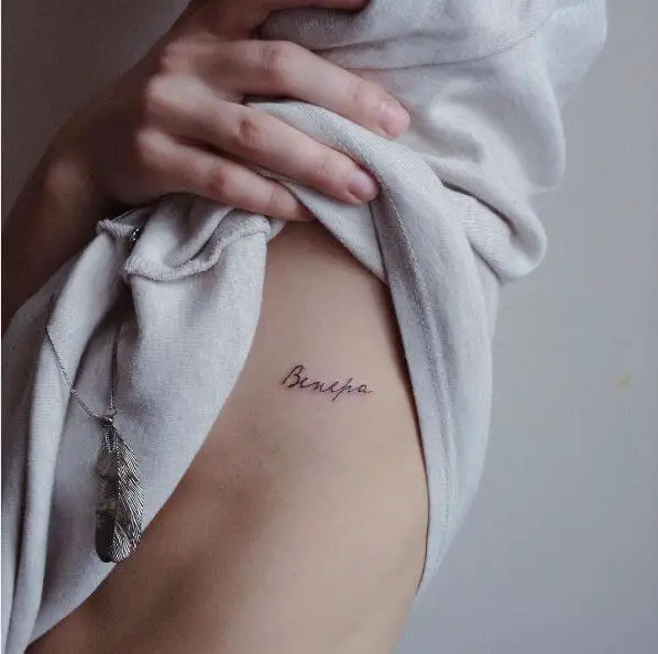 One Word On Side Chest Tattoo