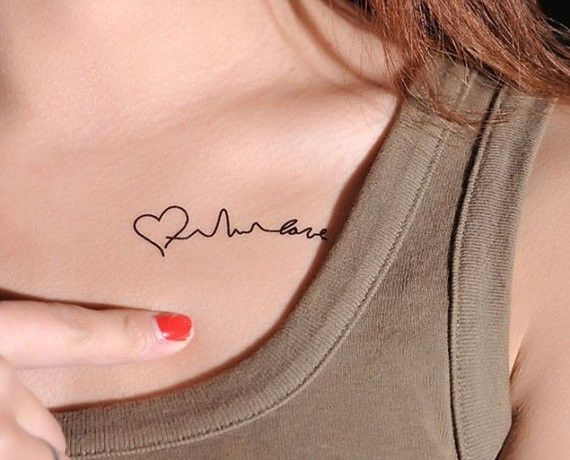 Signature And Heart Chest Tattoo