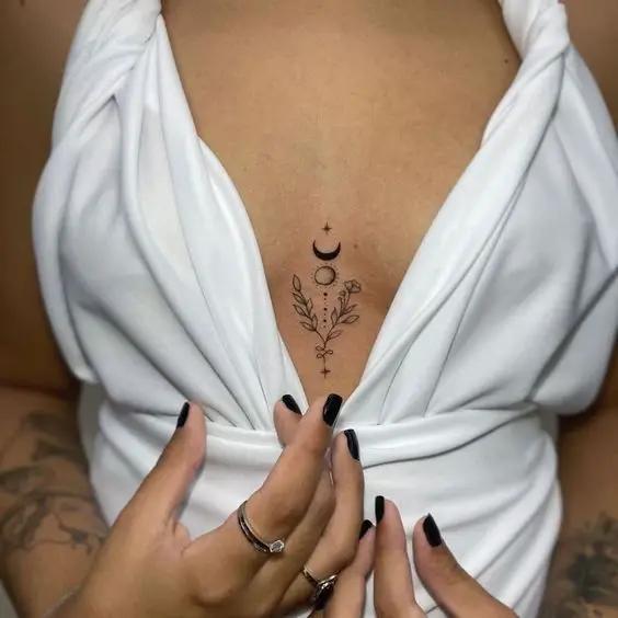Simple Sun And Moon Chest Tattoo