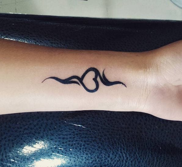 Small Tribal Tattoo With Heart 