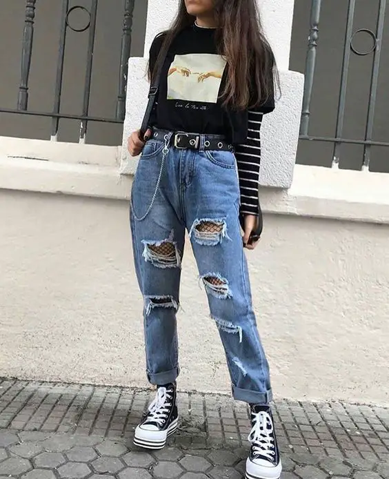 Ripped Jeans And Canvas Shoes