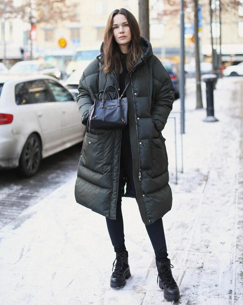 Black Oversized Puffer Jacket With Winter Boots