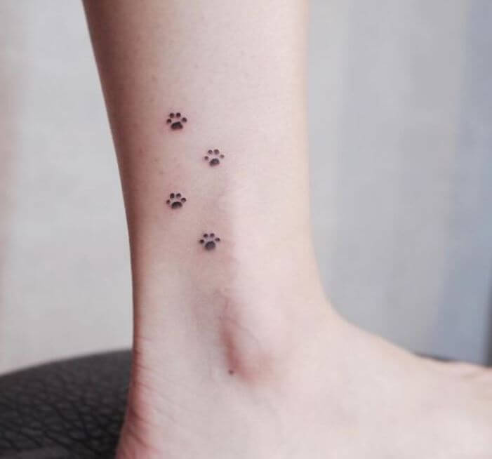 Tiny Paw-print Tattoo